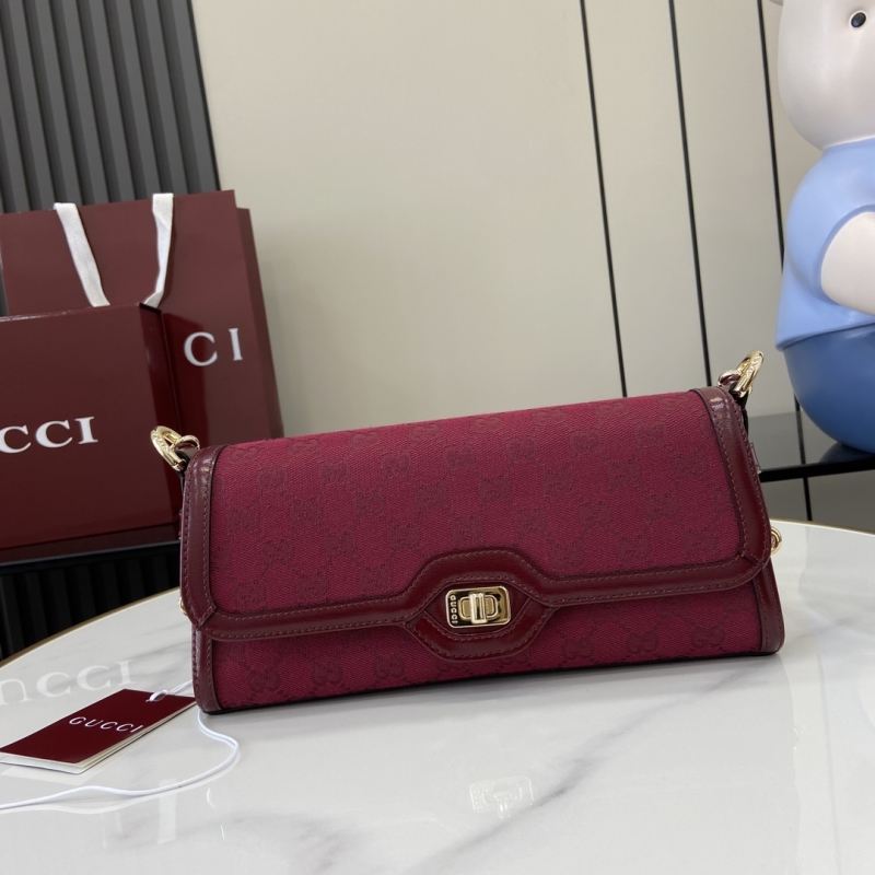 G*u*i top handle bags